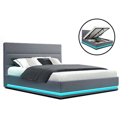Modern grey LED bed frame with storage and blue accent lighting, neatly made bed.