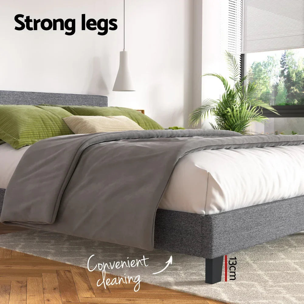 Modern platform bed with grey frame, strong black legs, and 13cm clearance for easy cleaning