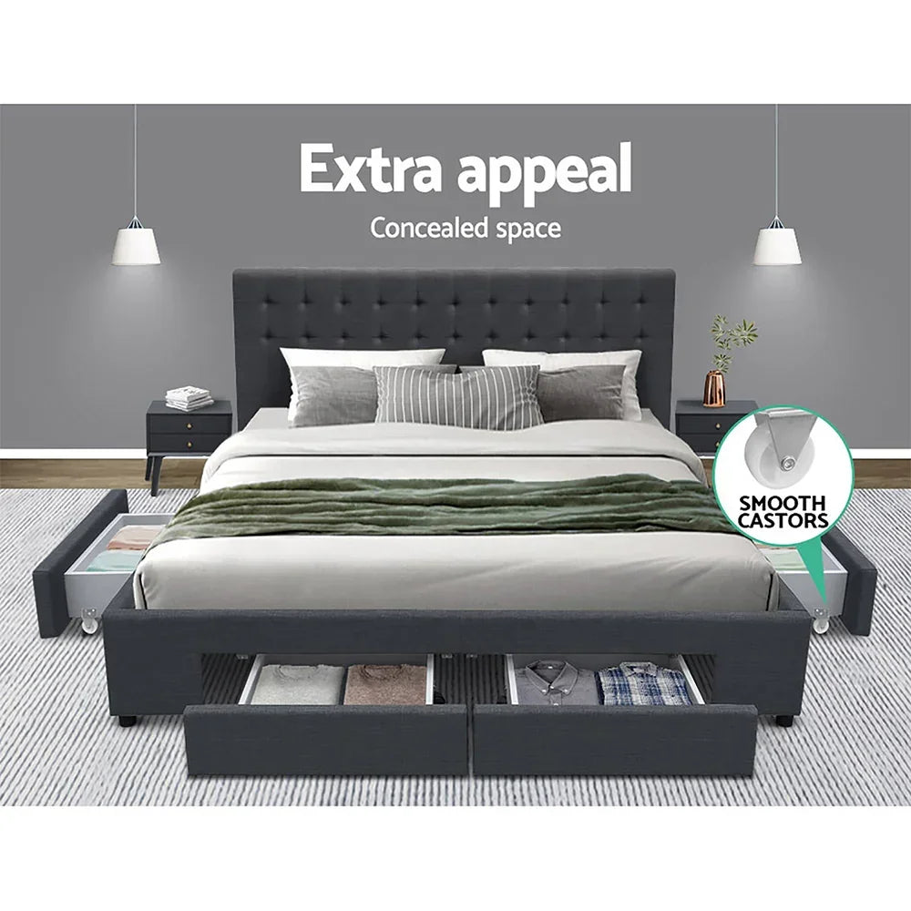 Upholstered storage bed frame in grey with drawers open, showing hidden storage space in bedroom.