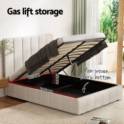 Beige upholstered gas lift storage bed frame with open under-bed storage, dimension labels, and fabric bottom.