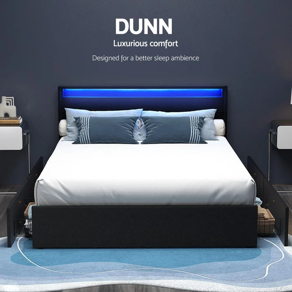 Modern queen bed with LED headboard, storage drawers, and blue accent pillows