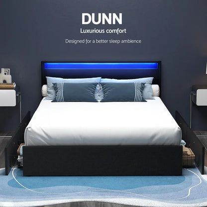 Modern queen bed with LED headboard, storage drawers, and blue accent pillows