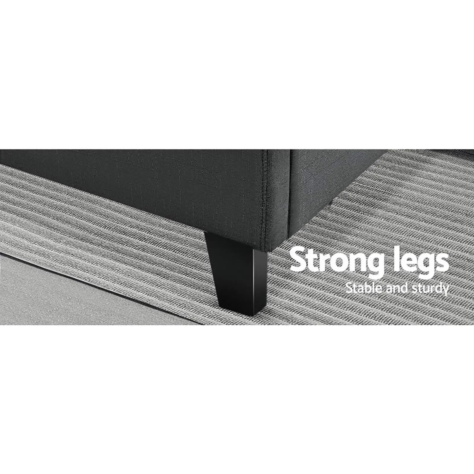 Sturdy black sofa leg on textured grey carpet, highlighting strong, stable furniture support.