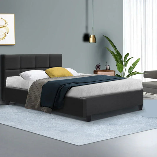 Modern queen bed frame with tufted black upholstered headboard in a stylish bedroom