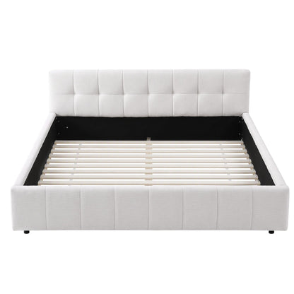 White tufted double bed frame shown at an angle