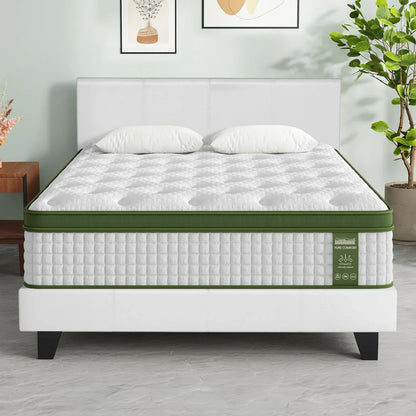 Queen size mattress on bed frame in modern bedroom with pillows and potted plant