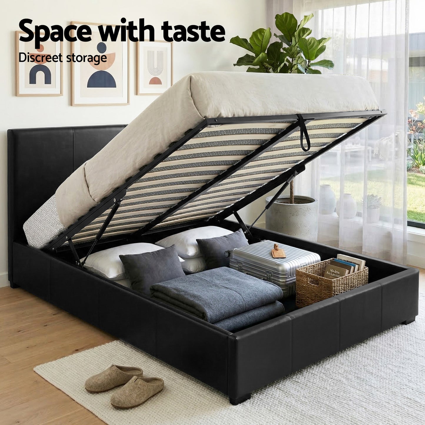 Black storage bed with lift-up mattress, showcasing discreet space-saving design for pillows, blankets, and luggage.