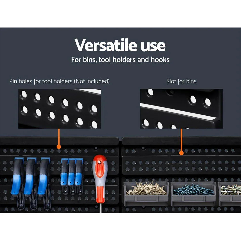 Black pegboard wall with slots for bins, pin holes for tool holders, and organized tools.