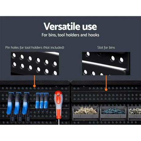 Black pegboard wall with slots for bins, pin holes for tool holders, and organized tools.