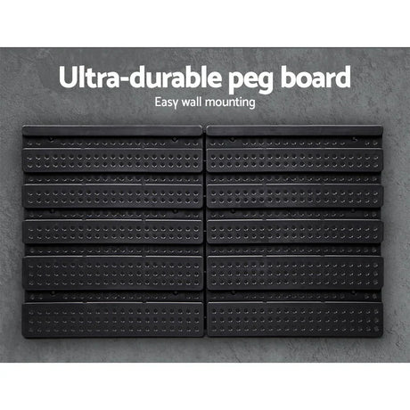 Black ultra-durable wall-mounted peg board with multiple rows for tool storage and organization.