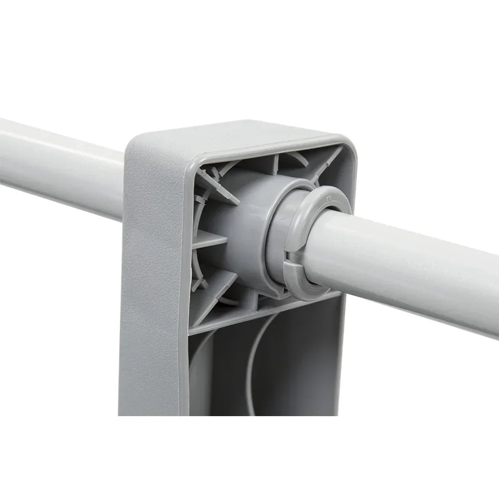 Close-up of a grey plastic laundry airer frame and support rod connection