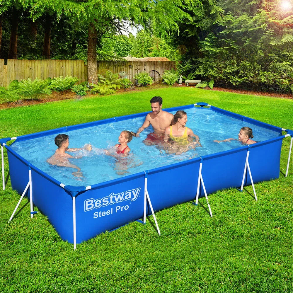 Rectangular above ground steel frame pool with family swimming in backyard garden