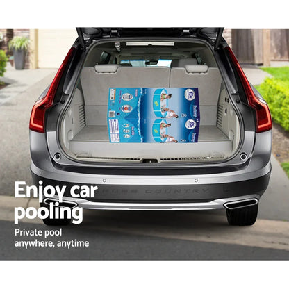 Car trunk with boxed inflatable pool for kids, ready for transport, home driveway setting.