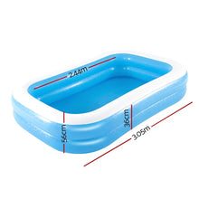 Rectangular blue inflatable pool with white rim, labeled dimensions 3.05m x 2.44m x 56cm.