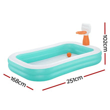 Inflatable rectangular kids pool with built-in basketball hoop, ball, and size dimensions displayed