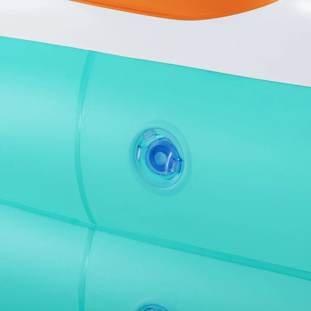 Close-up of inflatable pool wall with blue air valve, aqua and orange color sections