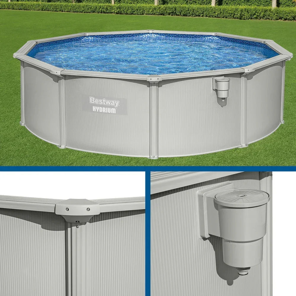 Round above ground steel swimming pool with filter, set up on green lawn.