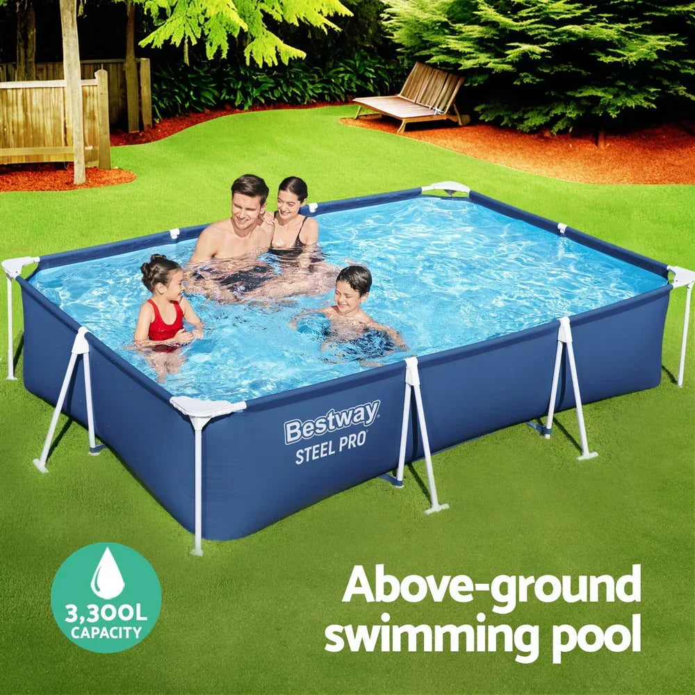 Family enjoying a rectangular above-ground swimming pool in a backyard garden setting
