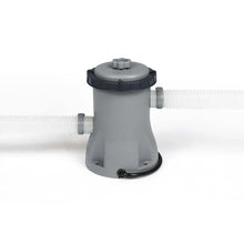 Grey plastic pool filter pump with attached hoses on a white background