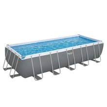 Rectangular above ground pool with grey steel frame and clear blue water