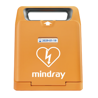 Orange portable Mindray AED defibrillator with heart symbol and expiry date display