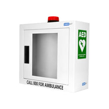 Wall-mounted AED cabinet with glass door, emergency alarm light, and green AED sign.