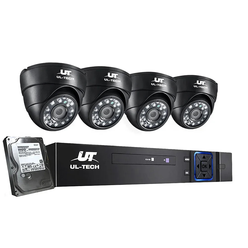 Security camera system with four black dome cameras, DVR recorder, and hard drive