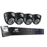 Security camera system with four black dome cameras, DVR recorder, and hard drive