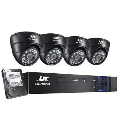 Security camera system with four black dome cameras, DVR recorder, and hard drive