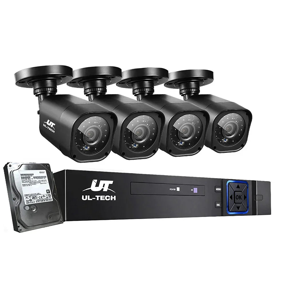 Four black outdoor security cameras with DVR recorder and hard drive, surveillance system kit