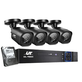 Four black outdoor security cameras with DVR recorder and hard drive, surveillance system kit