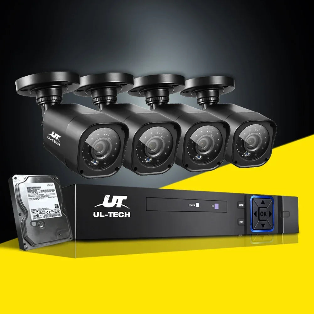 UL-Tech security camera system with four black CCTV cameras, DVR recorder, and hard drive.
