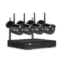 Wireless security camera system with four black bullet cameras and a digital video recorder
