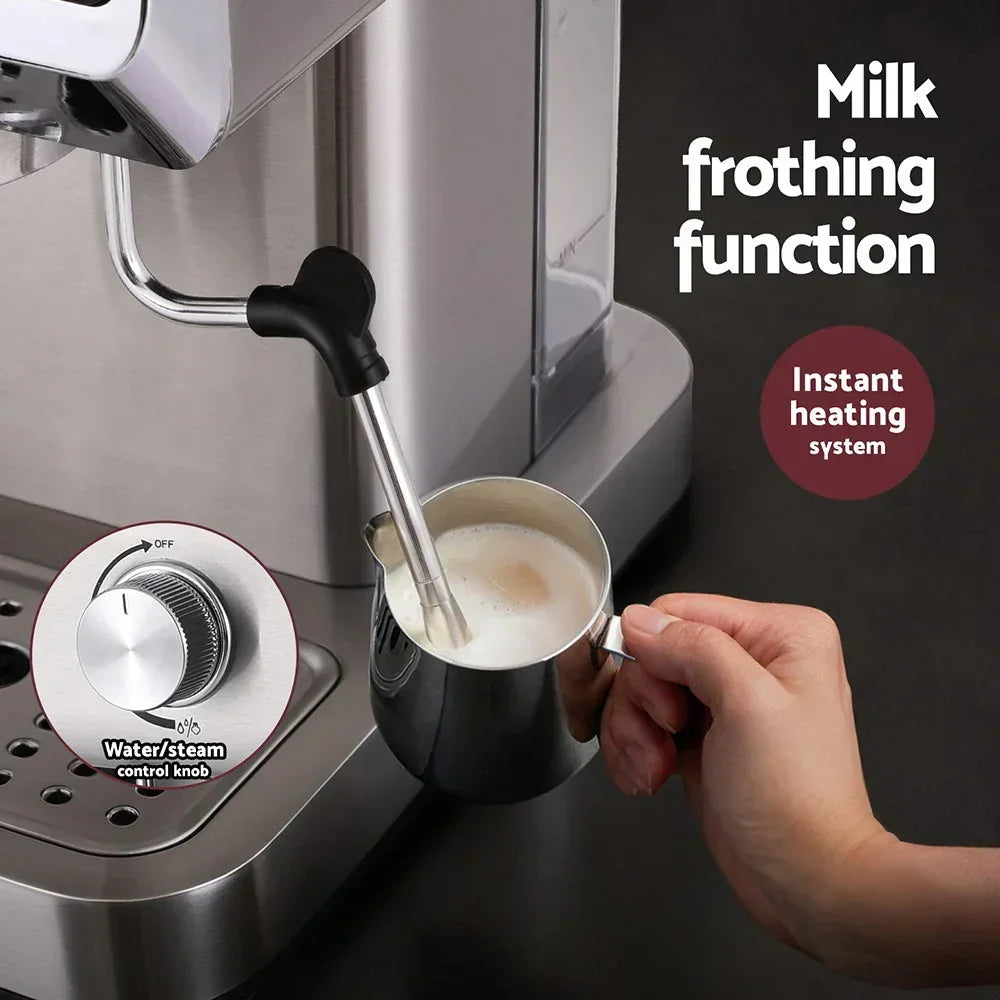 Espresso machine steaming milk with frothing wand, instant heating, water steam control knob