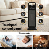Tower heater with touchpad control panel, multiple modes and timer, in living room
