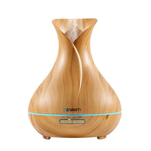 Wood grain essential oil diffuser with steam mist and digital control buttons