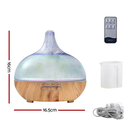 Aromatherapy essential oil diffuser with wood grain base, remote control, measuring cup, and power cord, 16x16.5cm.
