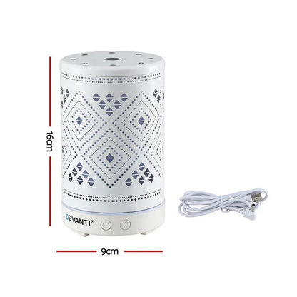 White cylindrical electric aroma diffuser with geometric cutout pattern, size 16cm x 9cm, and power cable.