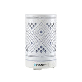 White electric aroma diffuser with geometric cut-out pattern and control buttons