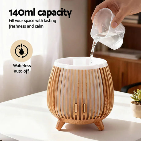 140ml wooden design aroma diffuser with waterless auto off, water being poured in