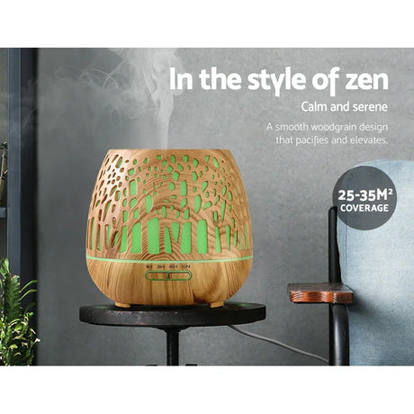 Woodgrain essential oil diffuser with green LED light and mist, suitable for 25-35m² rooms.