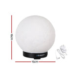 Round white table lamp with textured surface, 16cm tall, 15cm wide, black base, and power adapter