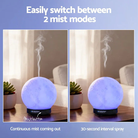 Moon lamp essential oil diffuser showing continuous and interval mist modes on a table