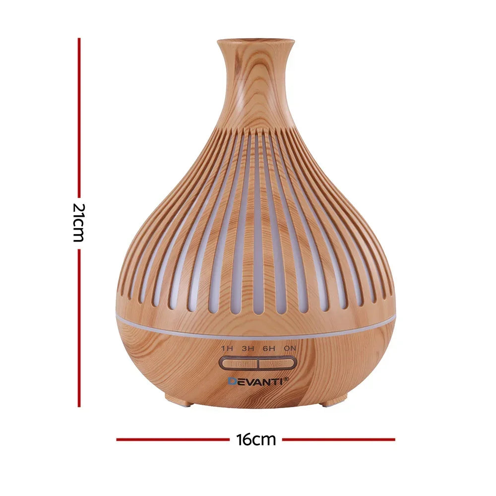 Wood grain essential oil diffuser, 21cm tall, 16cm wide, timer control panel visible.