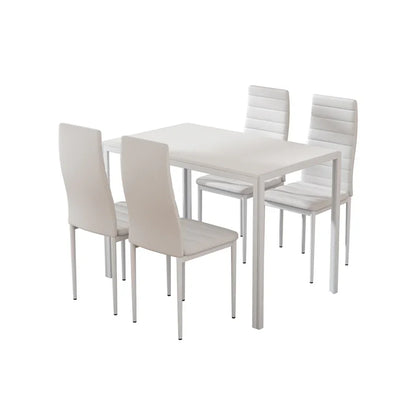 Modern white dining table set with four matching padded chairs on a white background