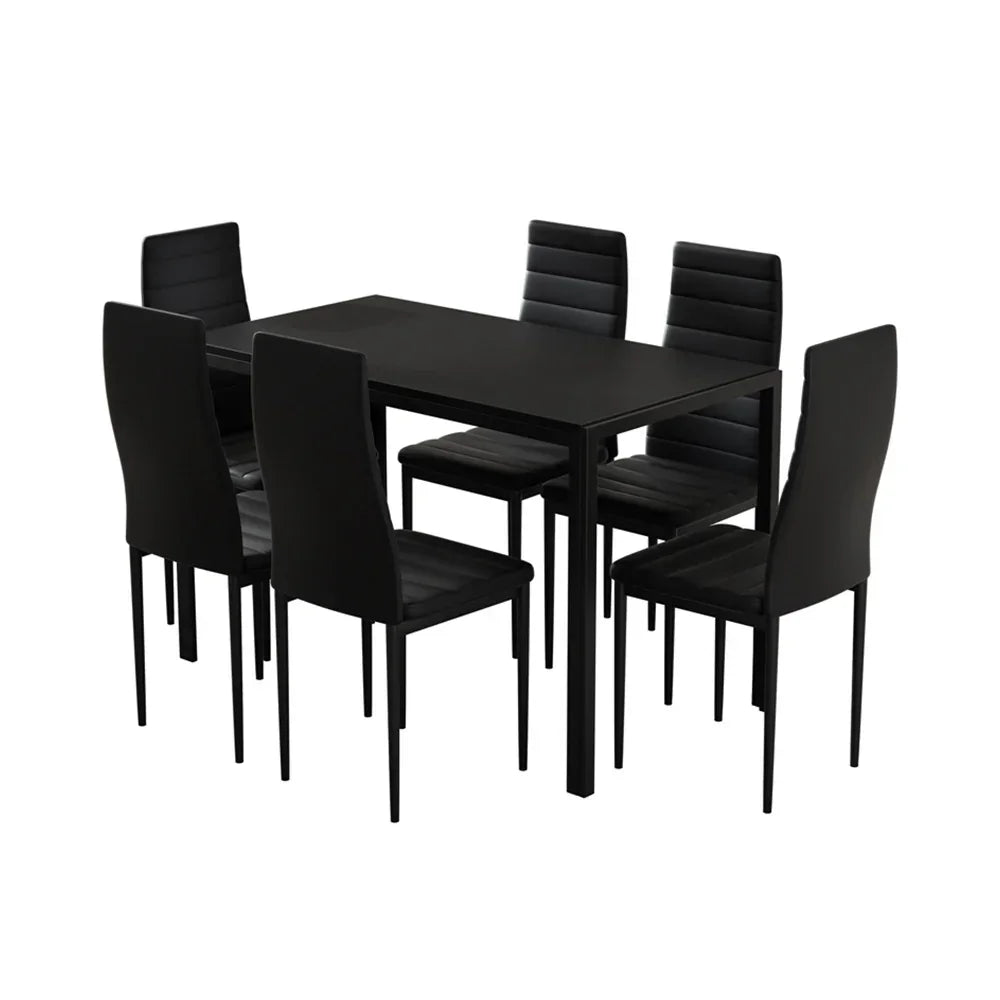 Modern black dining table set with six matching chairs, minimalist design, indoor furniture.