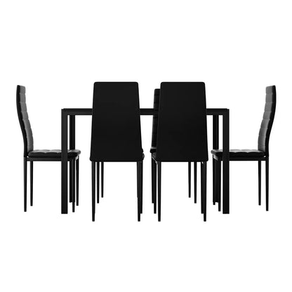 Modern black dining table set with four padded chairs on a white background