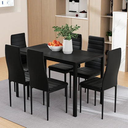Modern black dining table set with six chairs in a contemporary kitchen setting