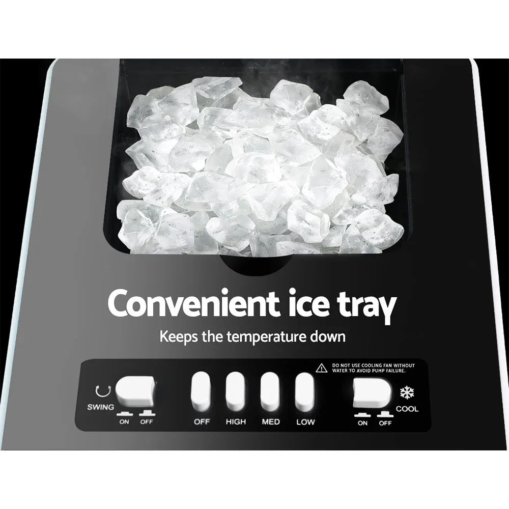 Electric appliance with ice tray, cooling controls, and clear ice cubes inside
