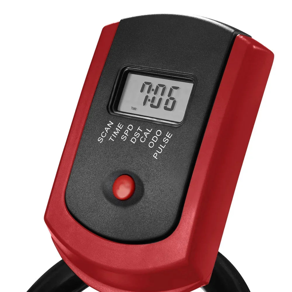 Close-up of a digital exercise bike display with red frame, LCD screen, and control button